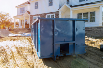 Dumpster rental outside a house