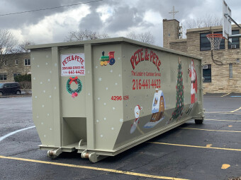 The dumpster was filled halfway at St. Basil and then delivered to St. Michaels to fill it up the rest of the way