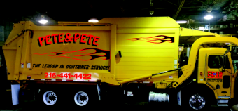 Pete & Pete yellow front load dumpster in Cleveland, Ohio.