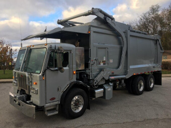 Pete and Pete's new front load dumpster truck providing better service to our customers in Cleveland, Ohio