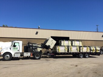 Front load dumpster delivery truck and trailer from Pete & Pete