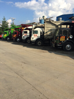 Pete & Pete's front load dumpster trucks ready for service in Cleveland, Ohio