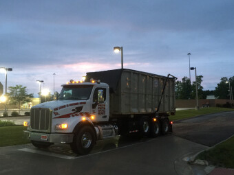 One of Pete & Pete's new roll off dumpster trucks in action in Cleveland, Ohio