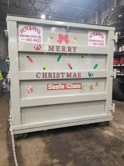 Our dumpster is decorated and ready for the holidays!